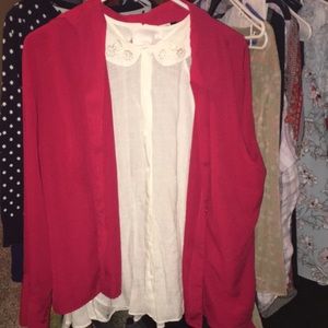 White sleeveless blouse red button up